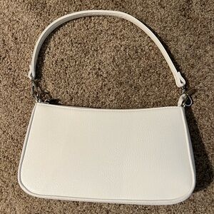 Plain white shoulder bag with silver detailing